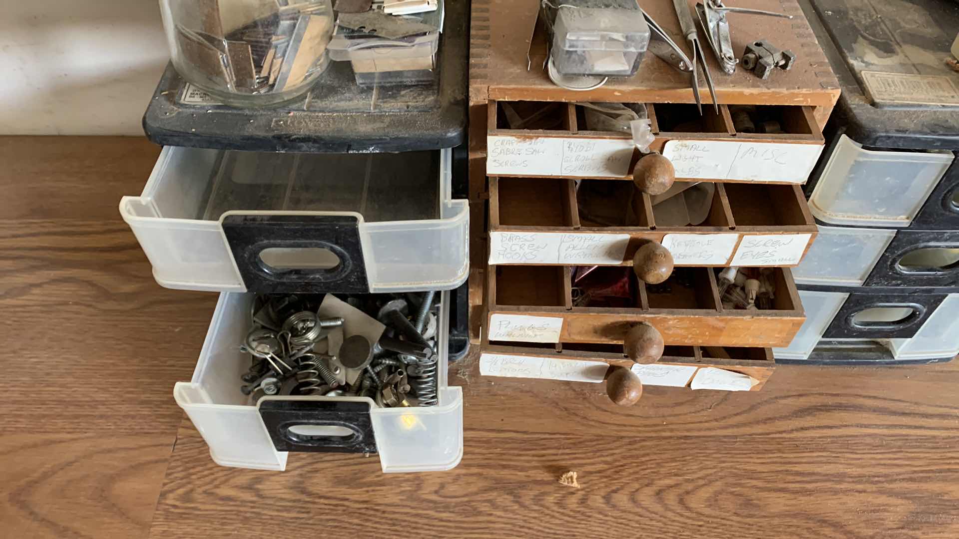 Photo 1 of CONTAINERS WITH HOUSE REPAIR ITEMS, GLASS CUTTERS, SHARPENING STONES