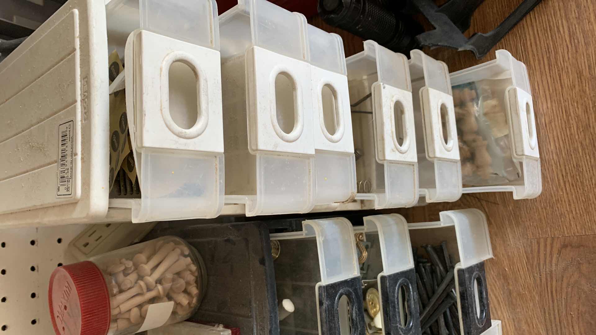 Photo 1 of CONTAINERS WITH HOUSE REPAIR ITEMS, GLASS CUTTERS, SHARPENING STONES