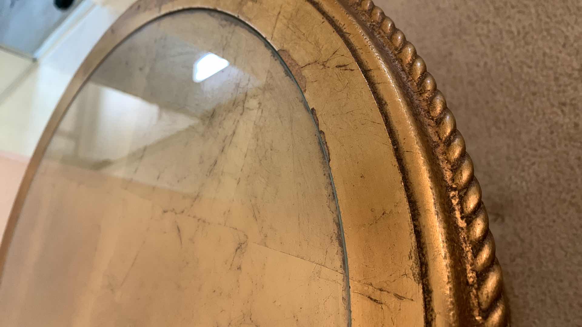 Photo 1 of GOLD PAINTED CIRCULAR TABLE WITH GLASS TOP 28” H 17”