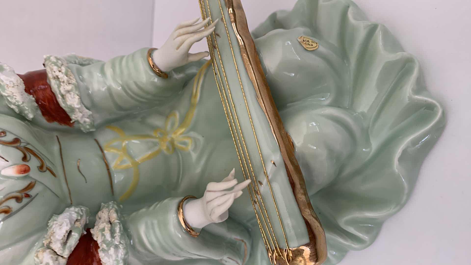 Photo 1 of ORIENTAL INSPIRED PORCELAIN STATUE10” X 11”