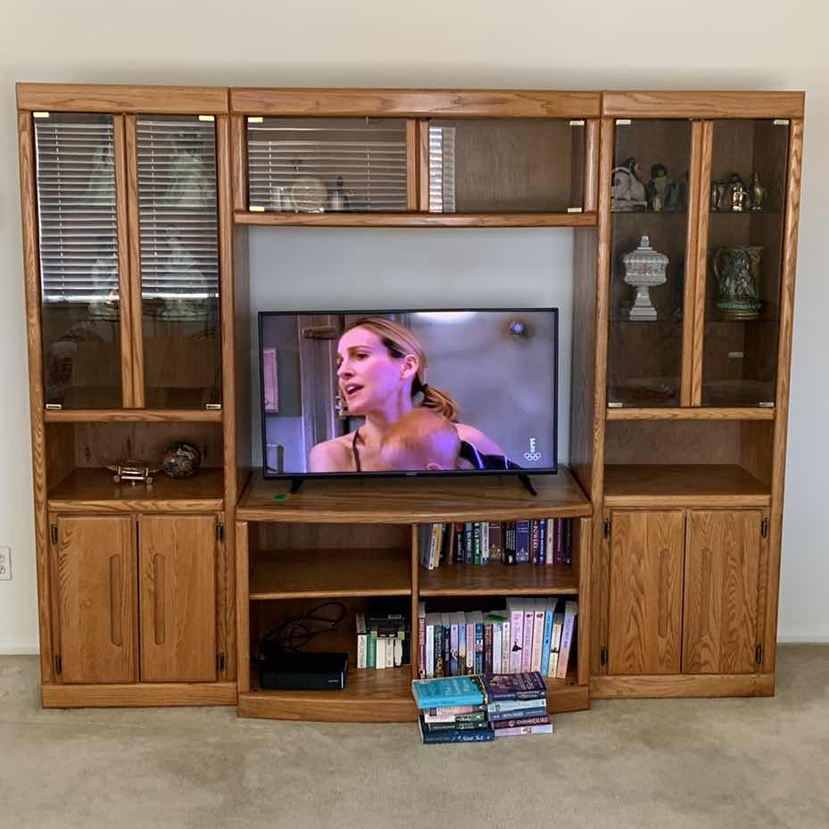 Photo 1 of THREE PIECE OAK ENTERTAINMENT CENTER 87” X 20 H 72”
