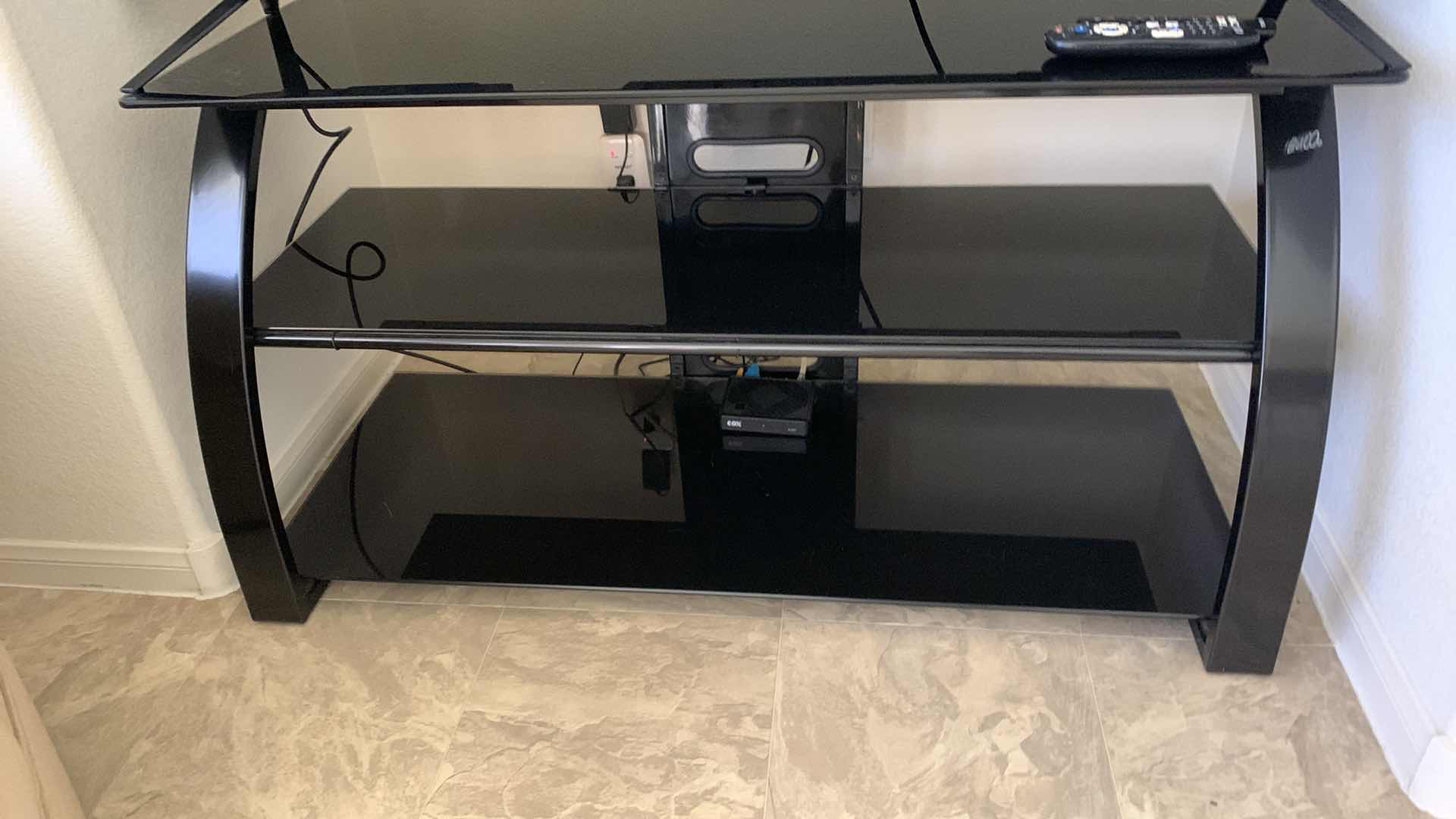 Photo 1 of TOSHIBA TELEVISION WITH STAND AND REMOTE