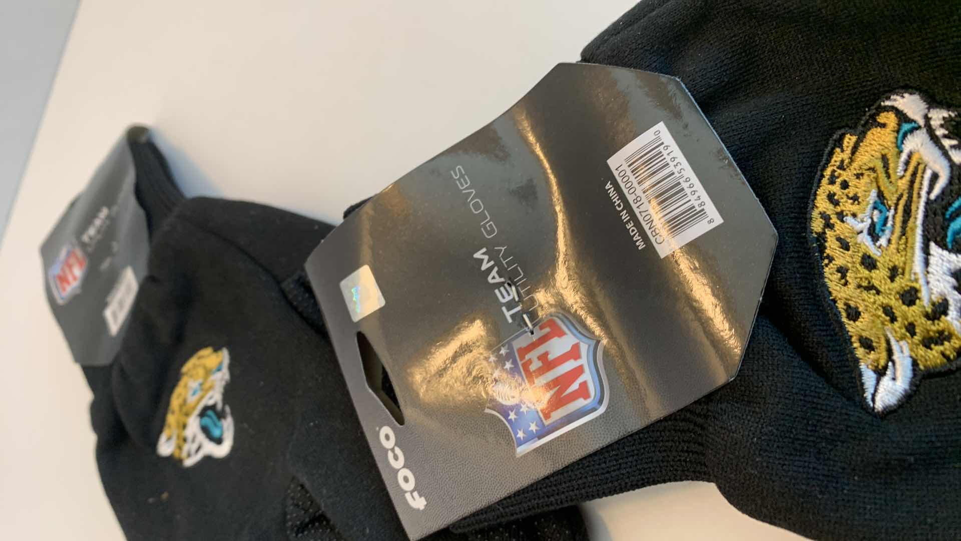 Photo 1 of NFL FOOTBALL JACKSONVILLE JAGUARS TEAM GLOVES