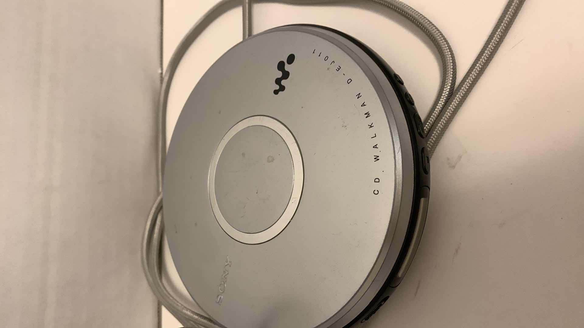 Photo 1 of SONY WATCHMAN 2.5” COLOR TELEVISION MODEL FDL-252T AND A SONY CD WALKMAN D-EJ011