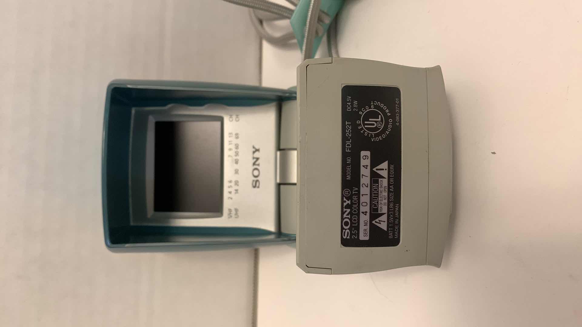 Photo 1 of SONY WATCHMAN 2.5” COLOR TELEVISION MODEL FDL-252T AND A SONY CD WALKMAN D-EJ011