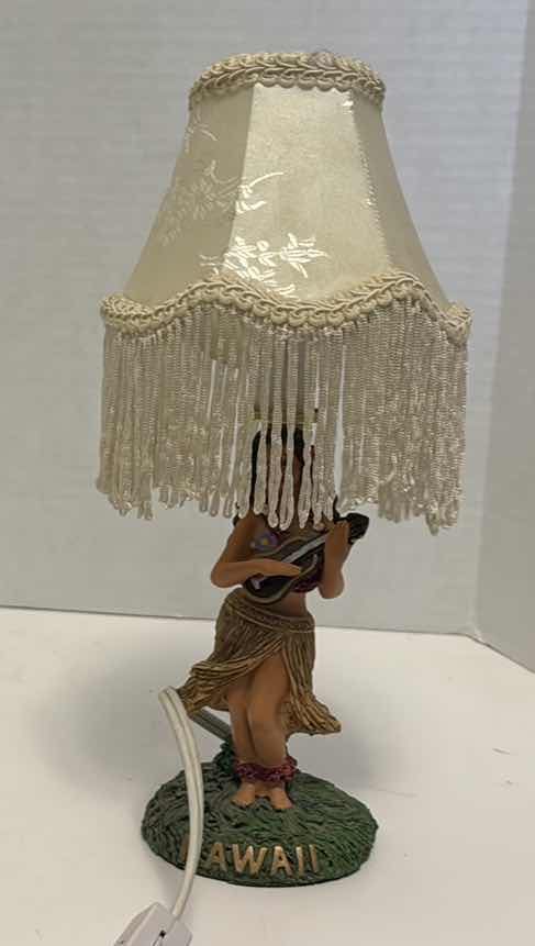 Photo 1 of HAWAIIAN NIGHT LIGHT
11” TALL AND 3 TIKIS