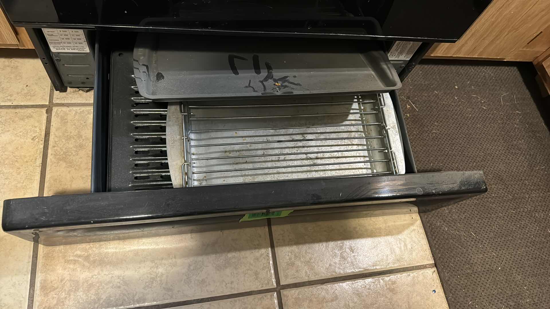 Photo 1 of CONTENTS OF OVEN DRAWER