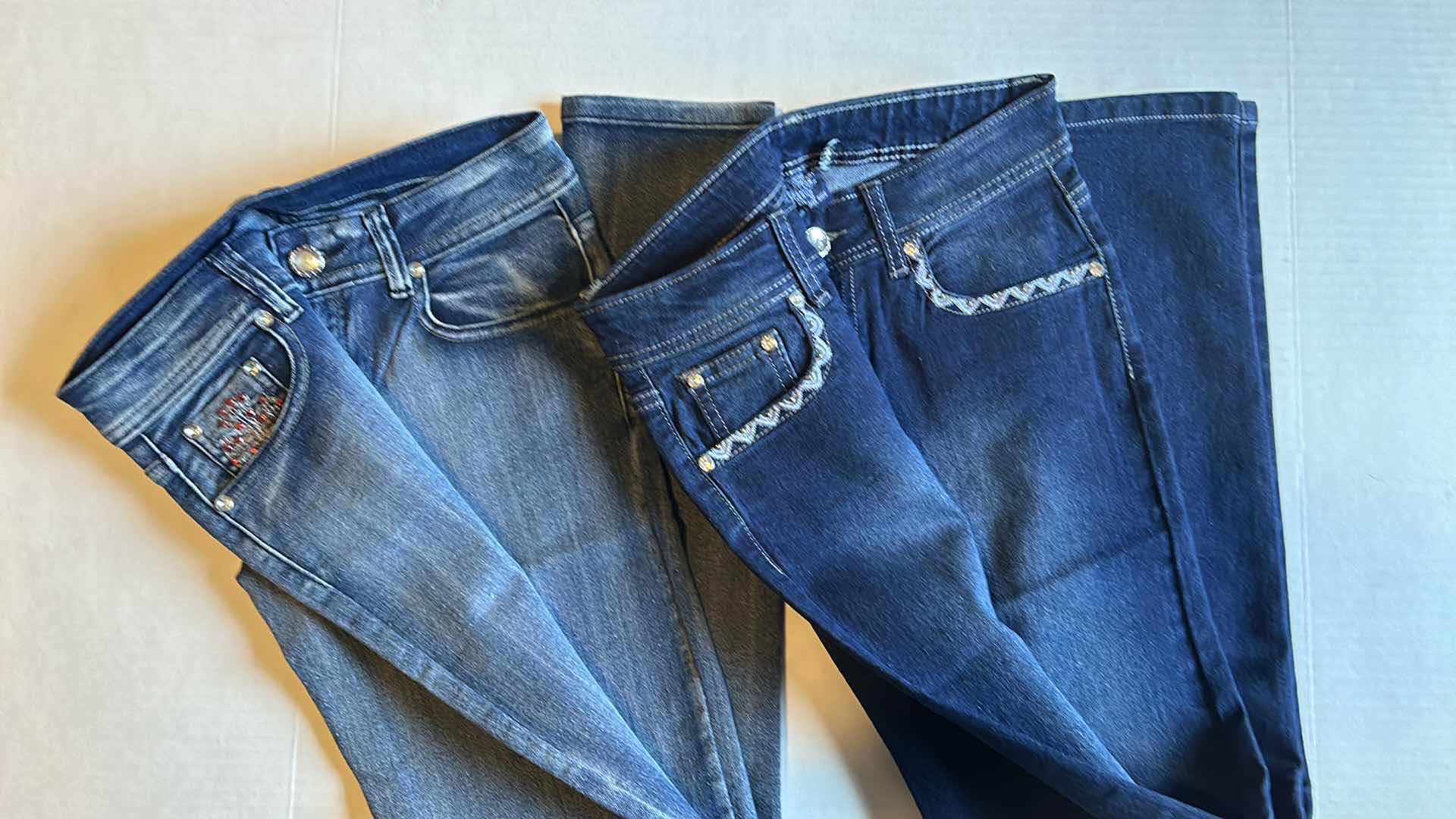 Photo 1 of SET OF SIZE 5 STRAIGHT LEG GIRL JEAN