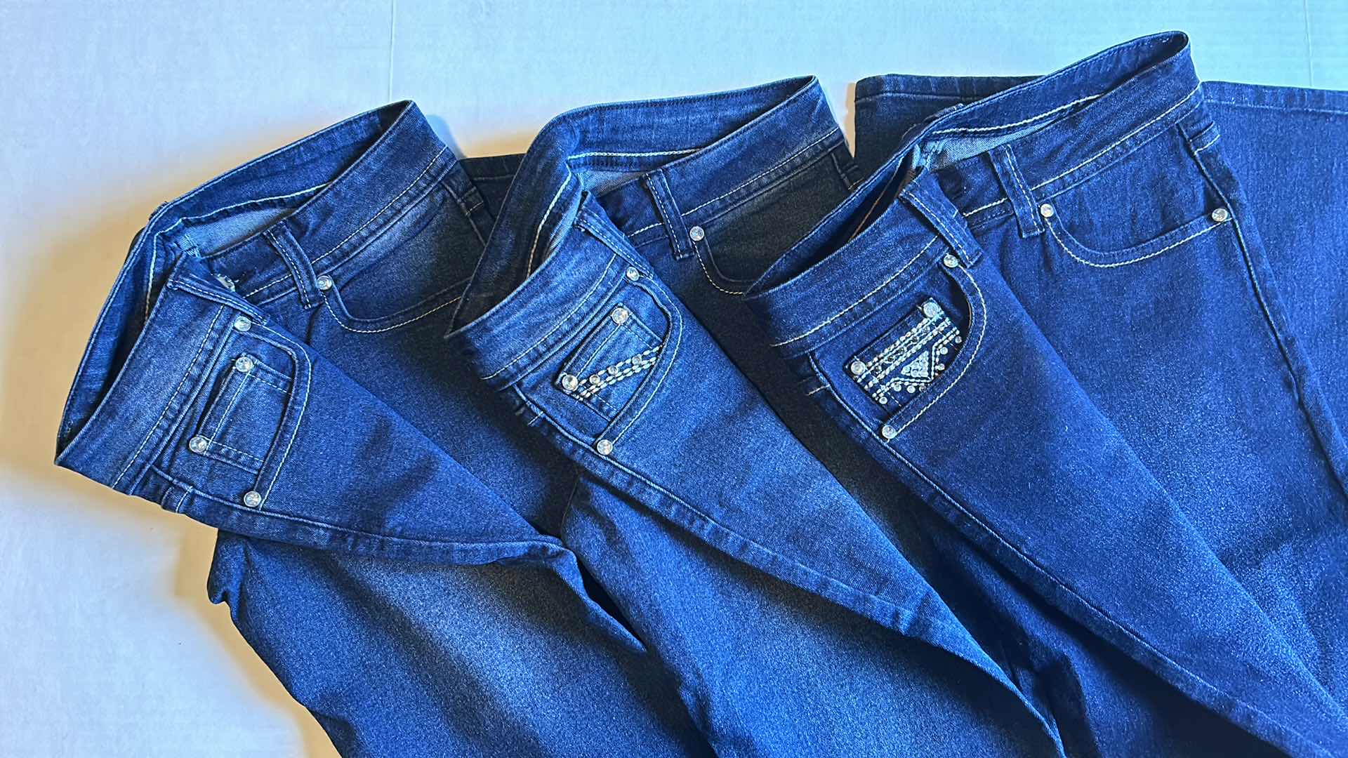 Photo 1 of SET OF SIZE 5 STRAIGHT LEG GIRL JEAN SIZE 1