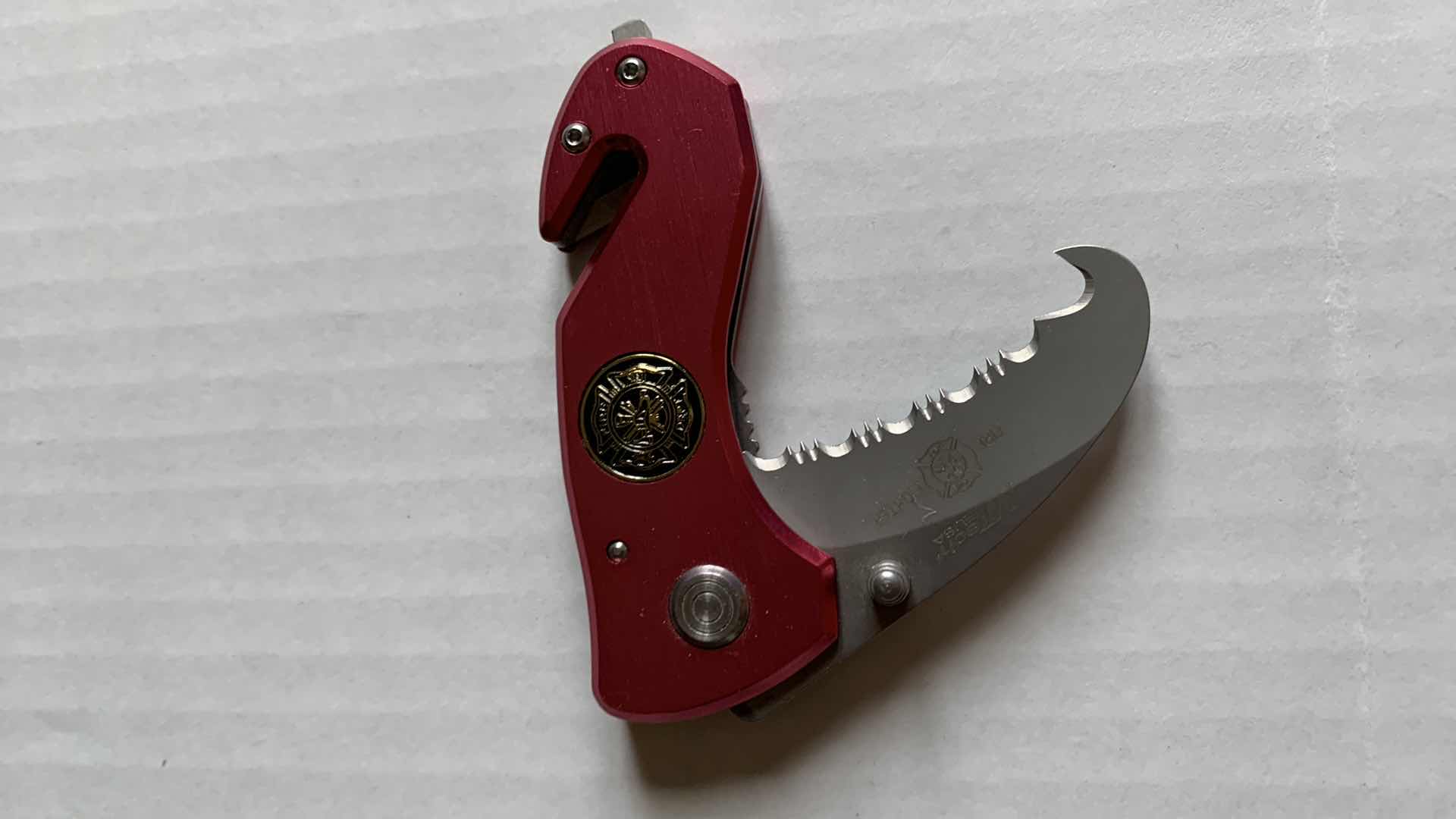 Photo 1 of PAIR OF KNIVES ONE IS FOR FIRE DEPARTMENT