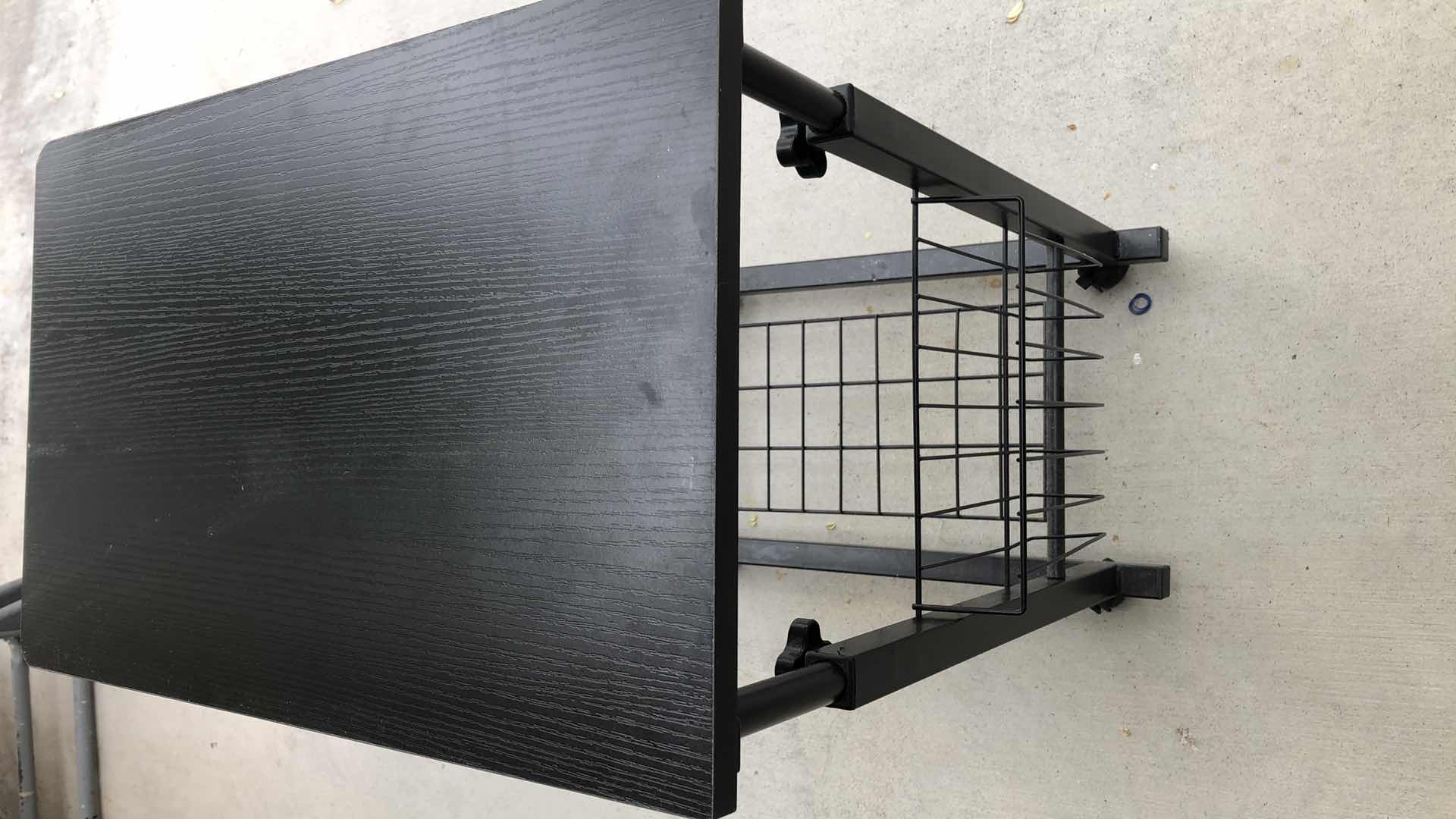 Photo 1 of ROLLING ADJUSTABLE TELEVISION TABLE 19” X 12” H 24”