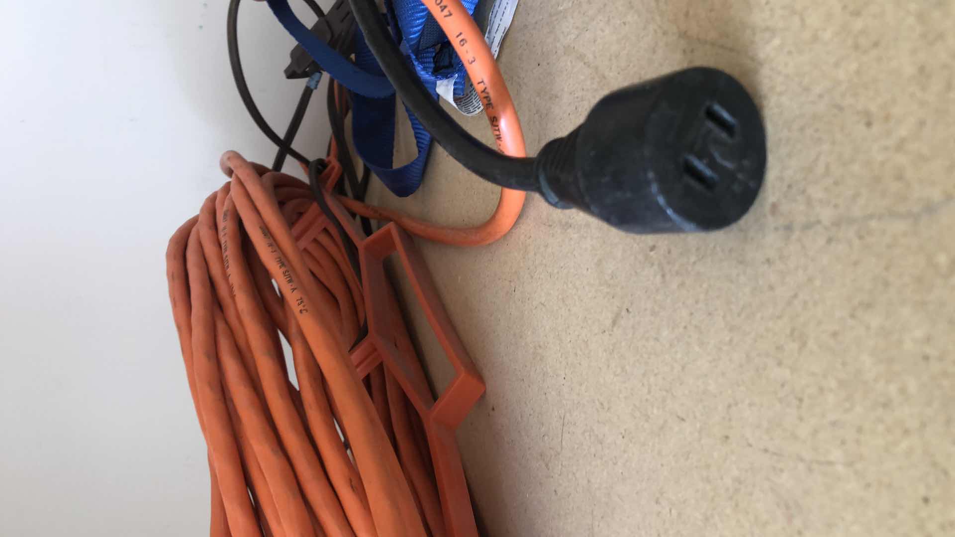Photo 1 of EXTENSION CORDS AND TIE DOWN STRAP