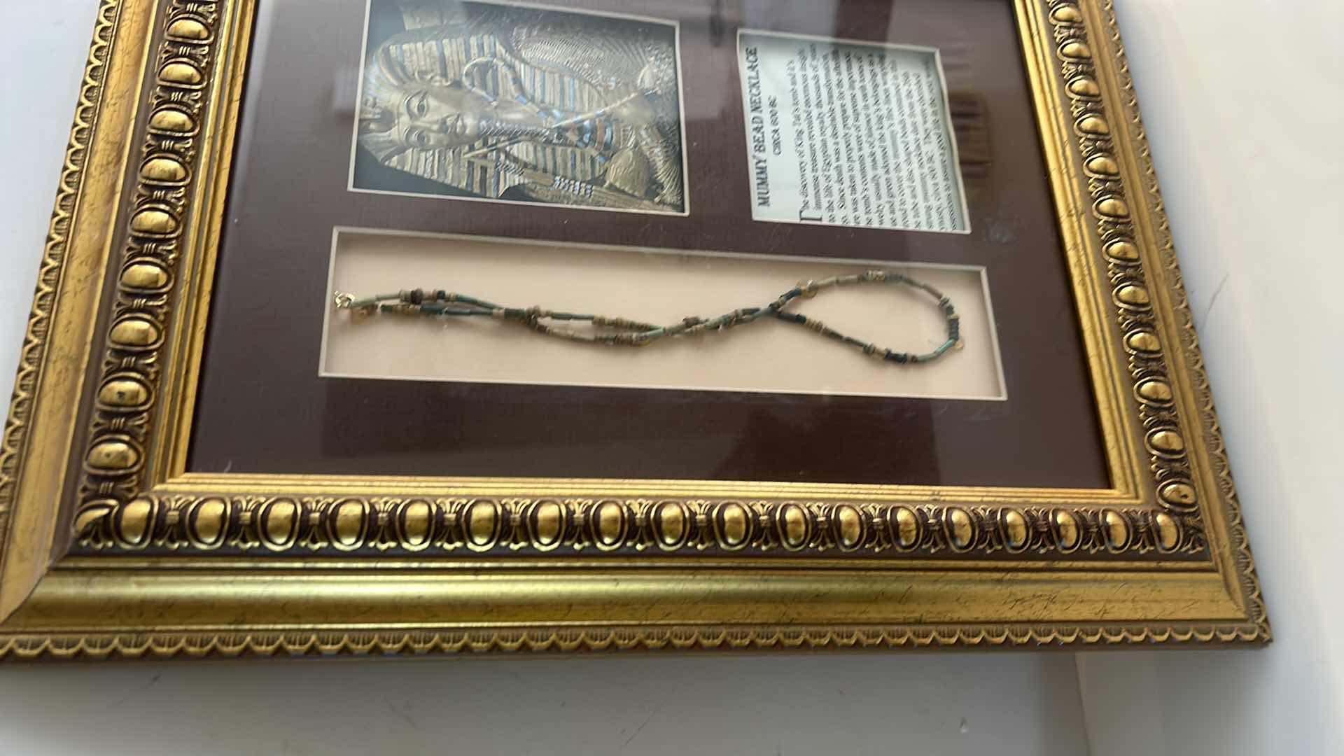 Photo 1 of ANTIQUITY - 26TH DYNASTY MUMMY BEAD NECKLACE CIRCA 600 BC IN GOLDEN FRAMED SHADOW BOX 20” x 16” WITH COA