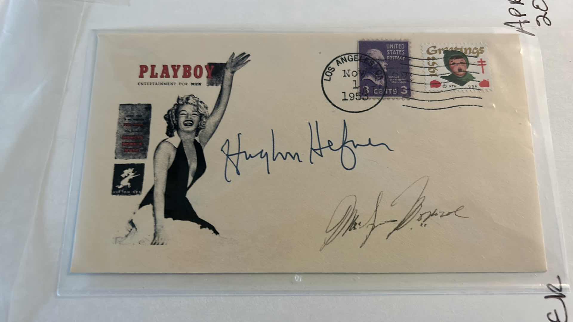 Photo 1 of 1955 ENVELOPE WITH MARILYN MONROE AND HUGH HEFNER SIGNATURES AND 1953 PLAYBOY COVER OF MARILYN MONROE FRAMED 12.25” x 14.25”
