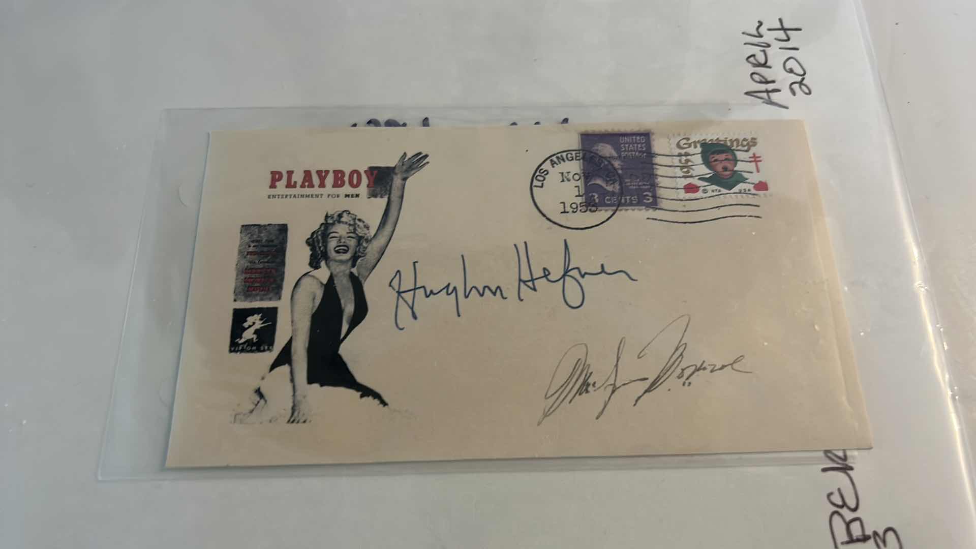 Photo 1 of 1955 ENVELOPE WITH MARILYN MONROE AND HUGH HEFNER SIGNATURES AND 1953 PLAYBOY COVER OF MARILYN MONROE FRAMED 12.25” x 14.25”