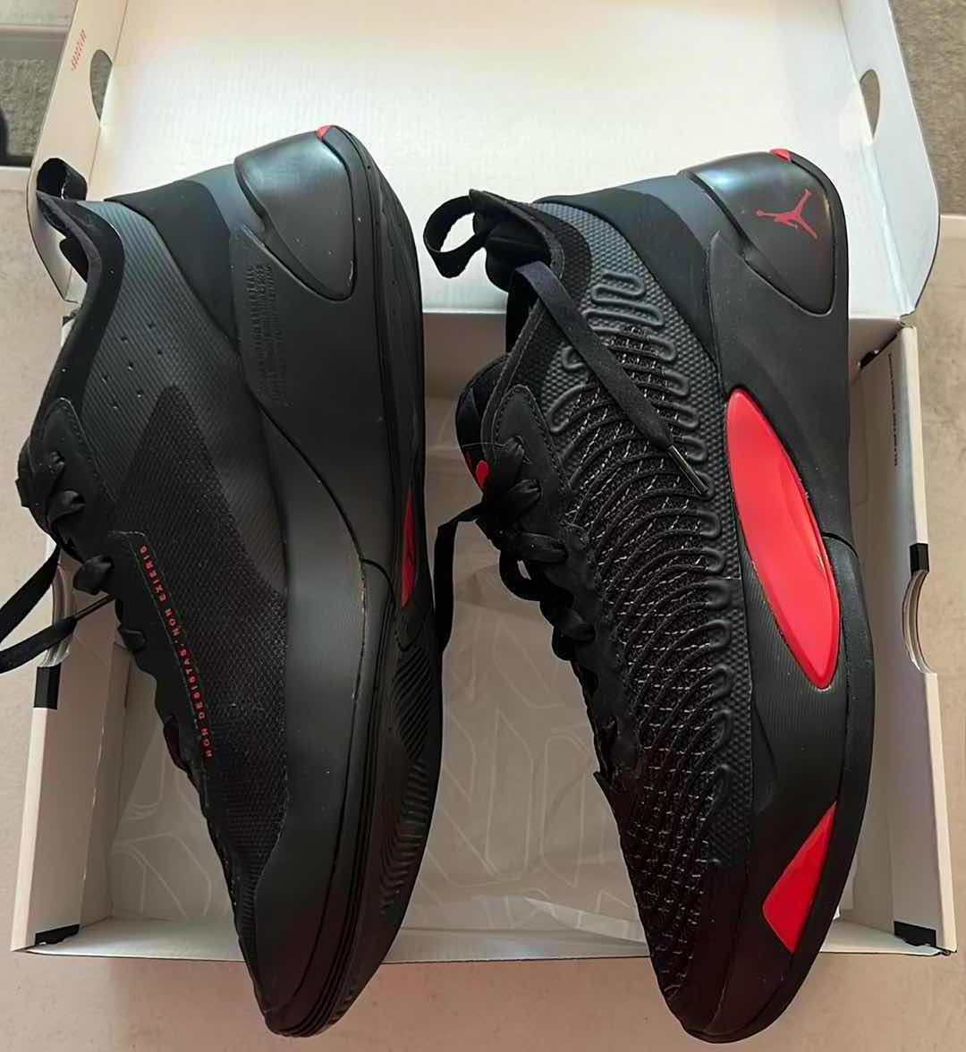 Photo 1 of LIKE NEW JORDAN LUKA 1 BLACK /UNIVERSITY RED-DARK GREY SHOES (SIZE 12)