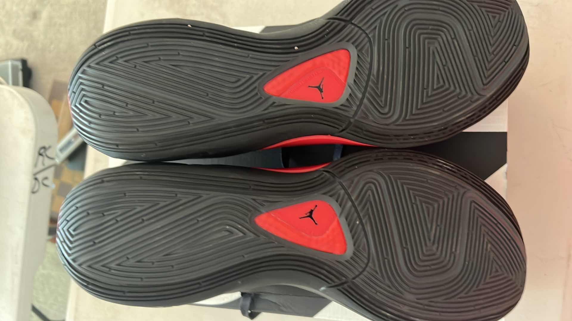 Photo 1 of LIKE NEW JORDAN LUKA 1 BLACK /UNIVERSITY RED-DARK GREY SHOES (SIZE 12)