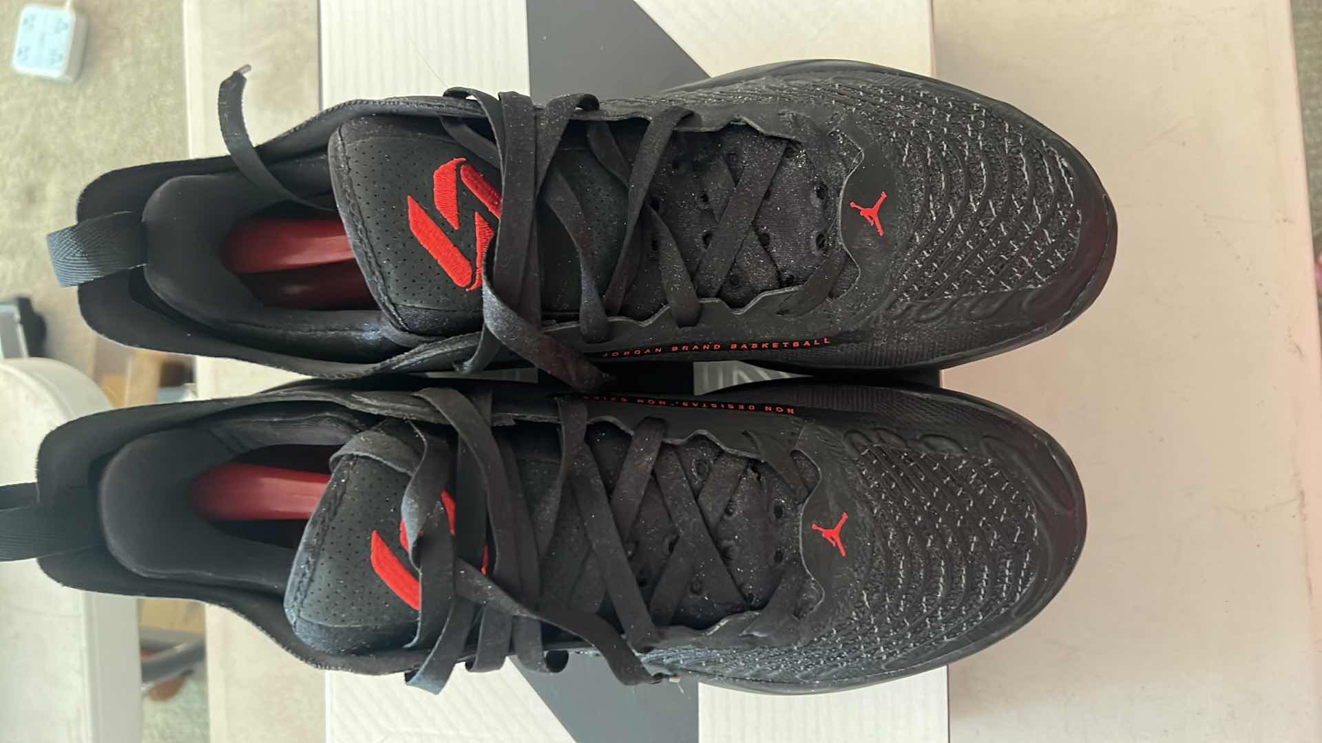 Photo 1 of LIKE NEW JORDAN LUKA 1 BLACK /UNIVERSITY RED-DARK GREY SHOES (SIZE 12)