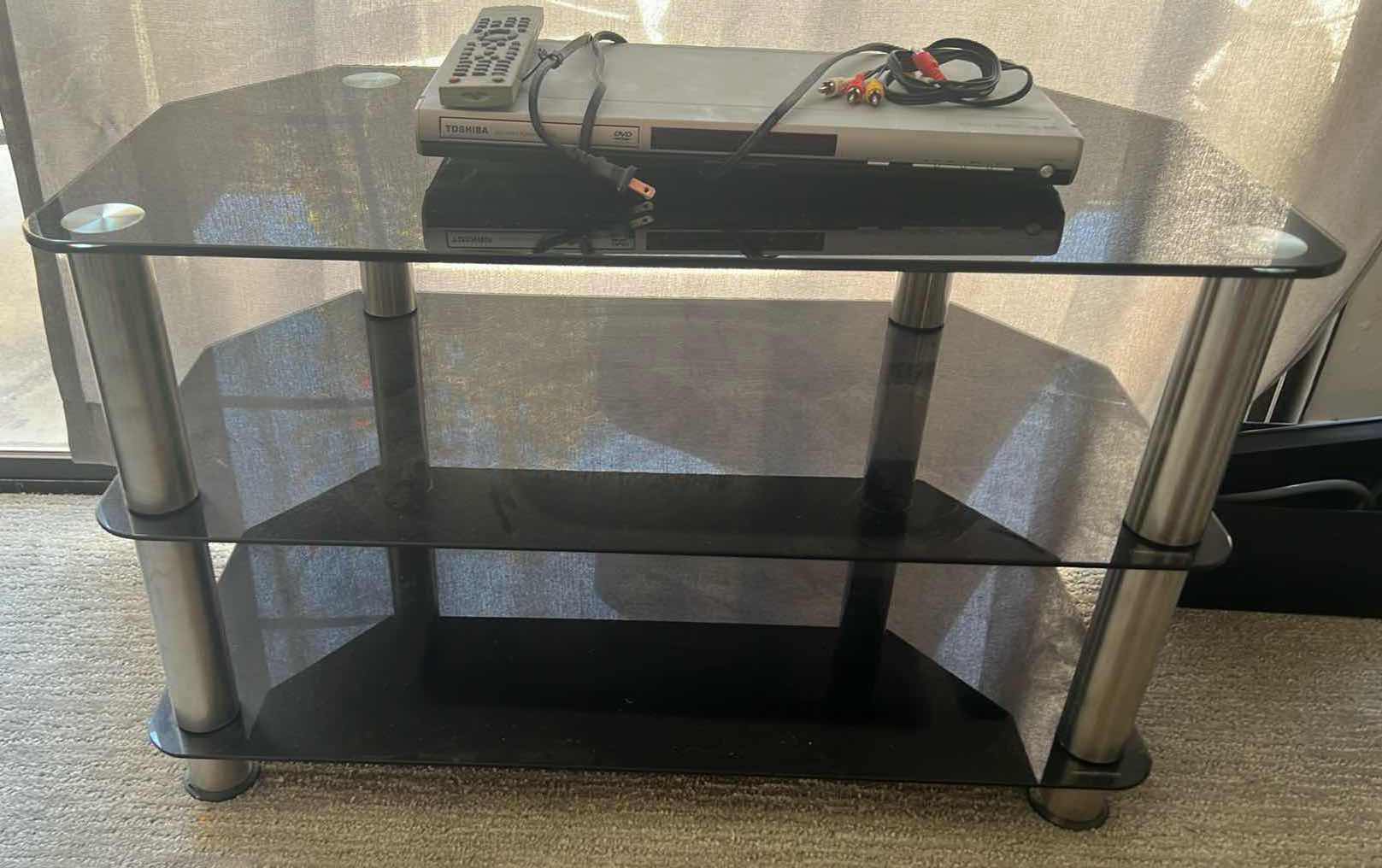 View 2 of SMOKED GLASS ENTERTAINMENT CENTER 32” x 17” H 20” W TOSHIBA DVD PLAYER & REMOTE