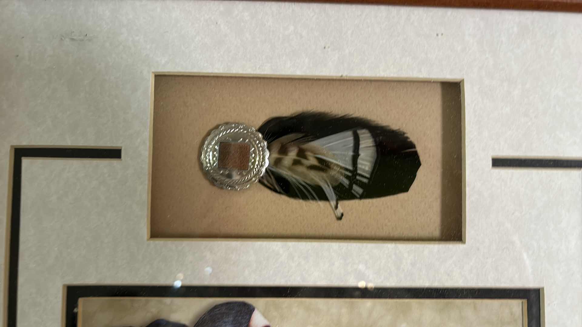 Photo 1 of 2- AMERICAN INDIAN ARTWORK WITH COMMEMORATIVE STAMP AND FEATHER FRAMED 13 1/2 x 16 1/2