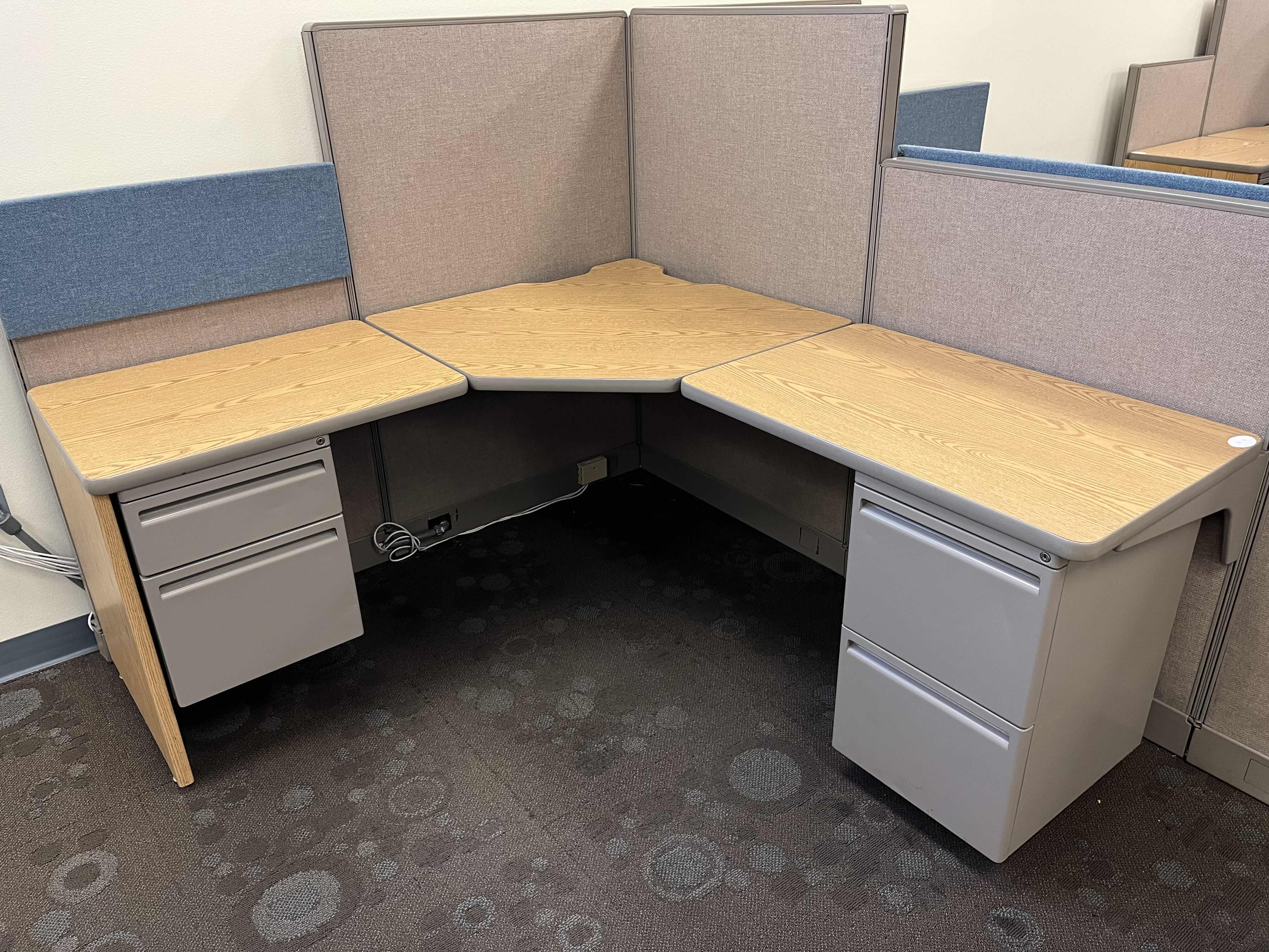 Photo 1 of HAWORTH BUILT IN CUBICLE L SHAPE OFFICE DESKS (3) W CUBICLE PANELS 
(OVERALL DIMENSIONS 151” X 135” H56”) READ NOTES
