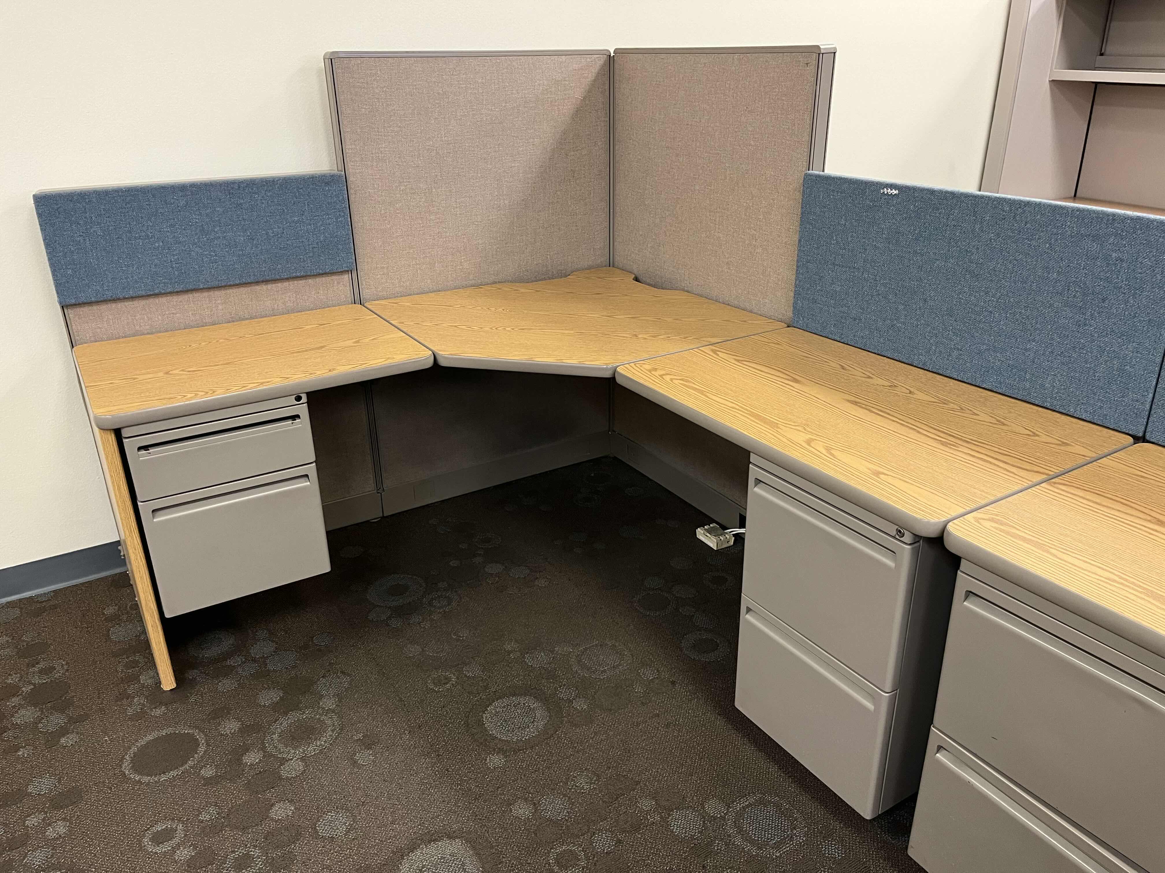 Photo 1 of HAWORTH BUILT IN CUBICLE L SHAPE OFFICE DESKS (2) W CUBICLE PANELS 
(OVERALL DIMENSIONS 151” X 68” H56”) READ NOTES