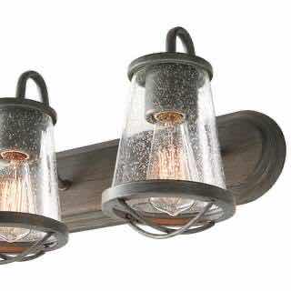 Photo 1 of HOME DECORATORS COLLECTION WEATHERED IRON FINISH & CLEAR SEEDED GLASS SHADES GEORGINA 3-LIGHT VANITY FIXTURE 1004 693 656
