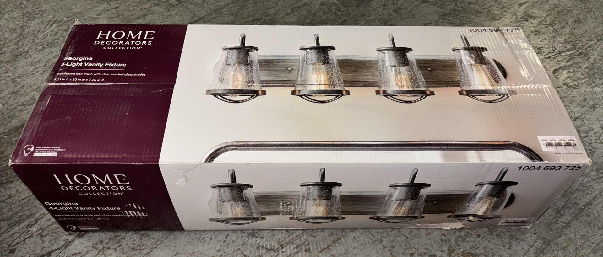 Photo 1 of HOME DECORATORS COLLECTION WEATHERED IRON FINISH & CLEAR SEEDED GLASS SHADES GEORGINA 4-LIGHT VANITY FIXTURE 1004 693 725