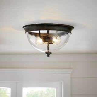 Photo 1 of HAMPTON BAY BRONZE IRVING 2-LIGHT FLUSH MOUNT CEILING LIGHT W CLEAR SEEDED GLASS SHADE 1003 324 683