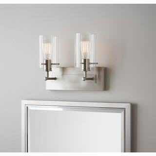 Photo 1 of HAMPTON BAY REGAN 12.75” BRUSHED NICKEL CLEAR GLASS SHADE 2 LIGHT VANITY FIXTURE LIGHT 802513190762