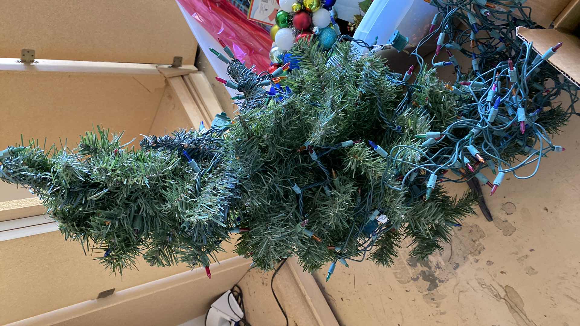 Photo 1 of ASSORTED CHRISTMAS DECOR IN GARAGE CABINET