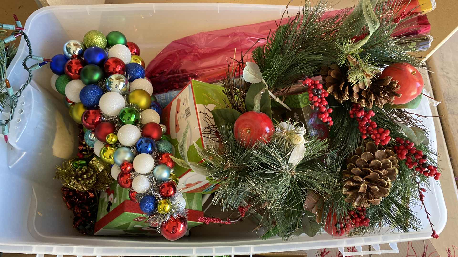 Photo 1 of ASSORTED CHRISTMAS DECOR IN GARAGE CABINET
