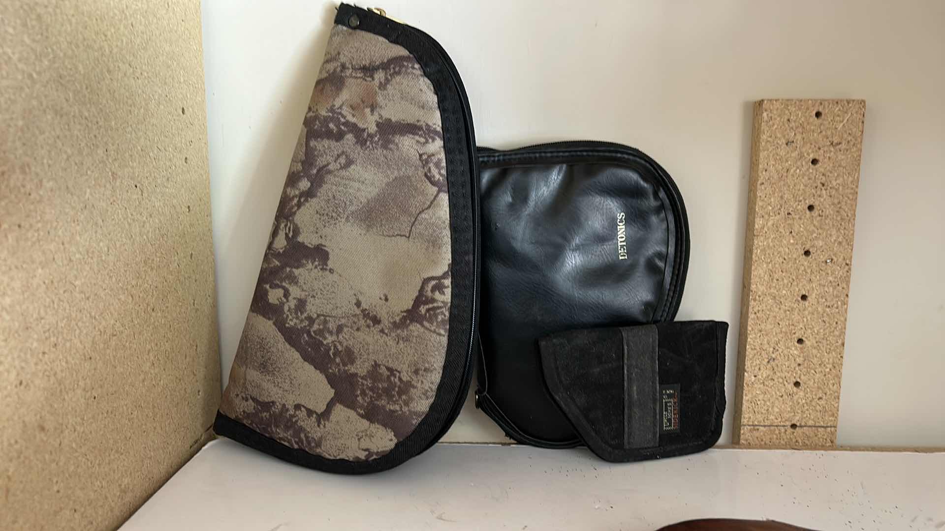 Photo 1 of GUN AND BULLET HOLSTERS