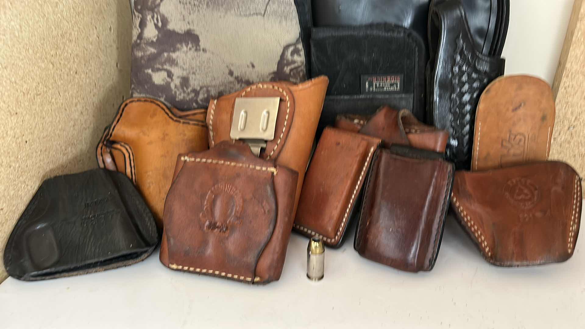 Photo 1 of GUN AND BULLET HOLSTERS