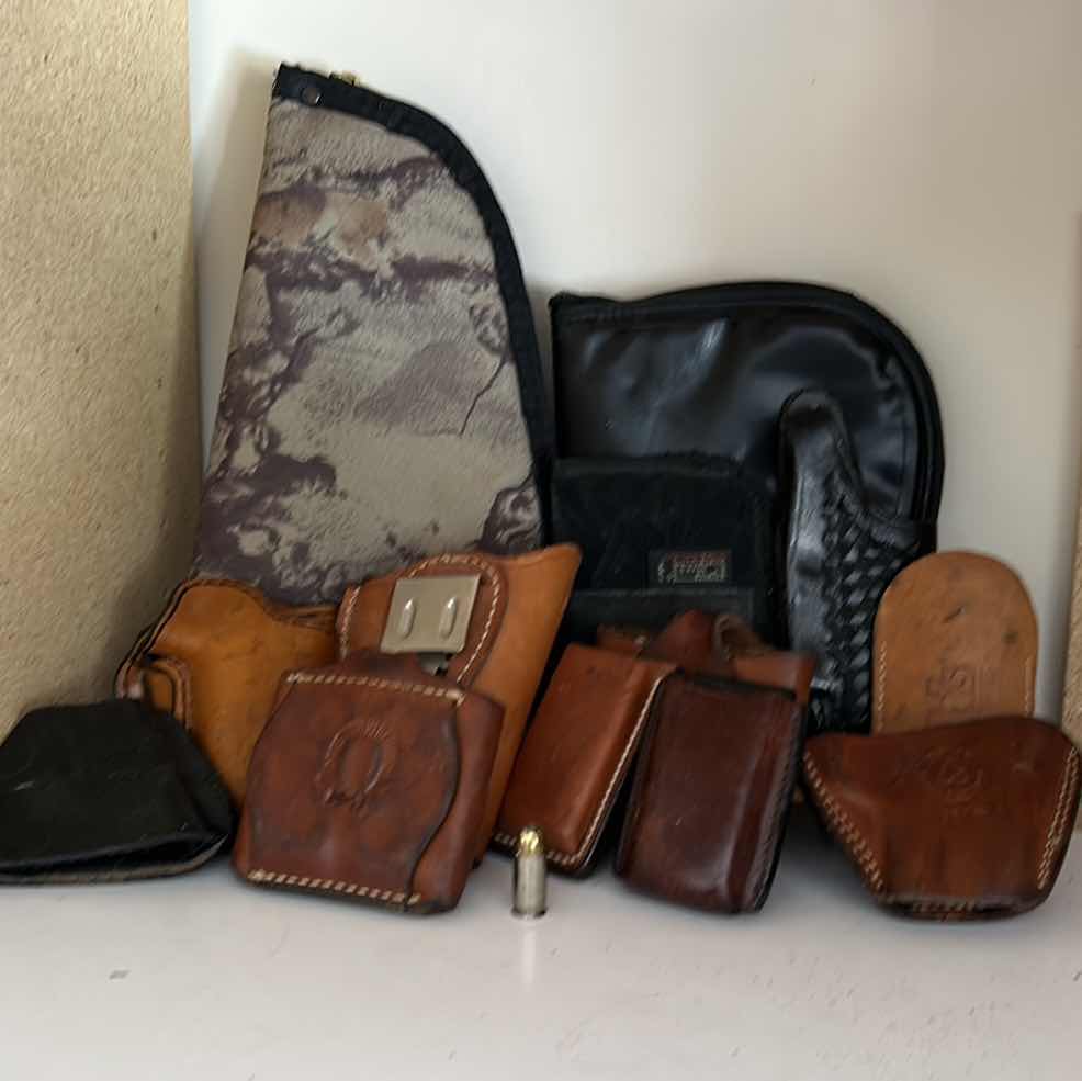 Photo 1 of GUN AND BULLET HOLSTERS