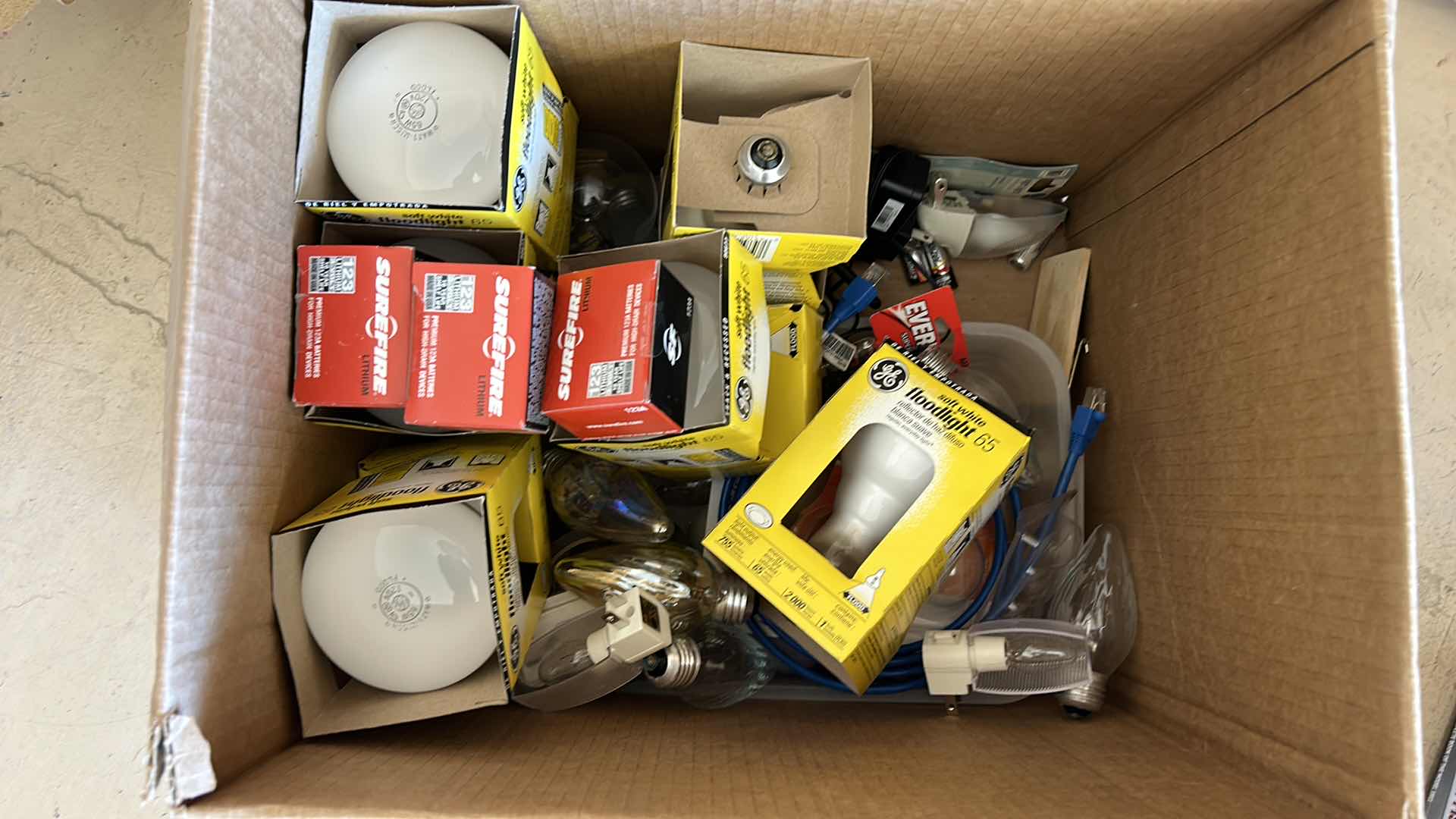 Photo 1 of BOX FULL OF LIGHT BULBS, BATTERIES AND MORE