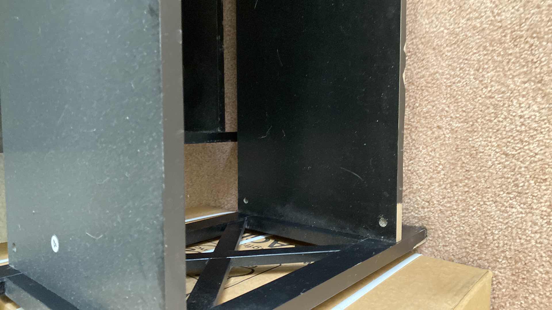 Photo 1 of PAIR OF BLACK PARTICLE BOARD BOOK SHELVES 32“ x 11“ H 59”