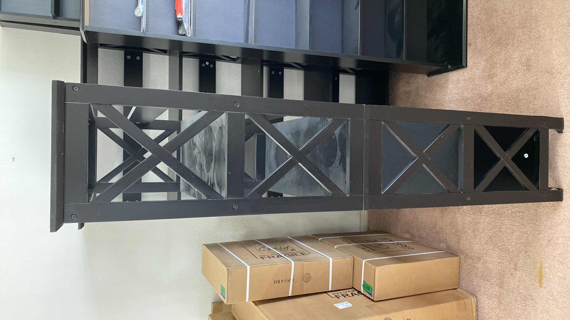 Photo 1 of PAIR OF BLACK PARTICLE BOARD BOOK SHELVES 32“ x 11“ H 59”