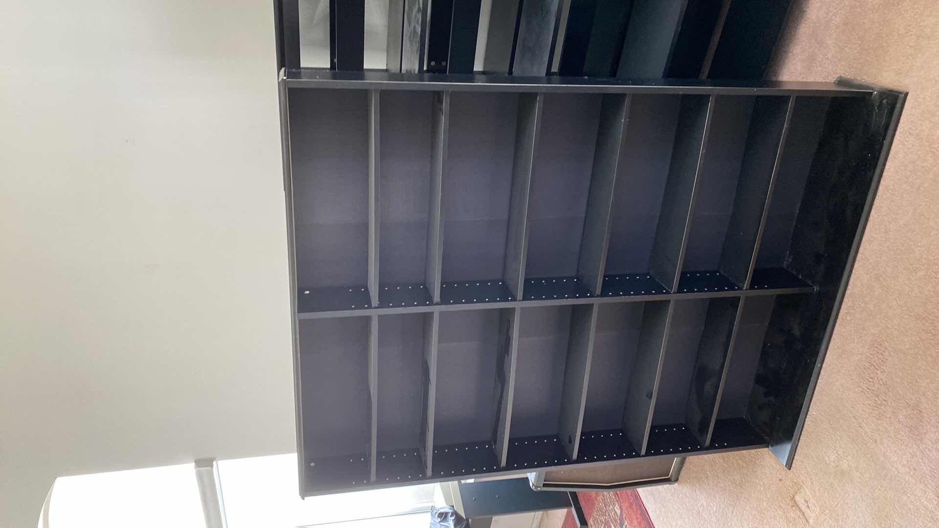 Photo 1 of DVD/CD STORAGE BLACK PARTICLE BOARD ADJUSTABLE SHELVES 45“ x 9 1/2“ H 59”