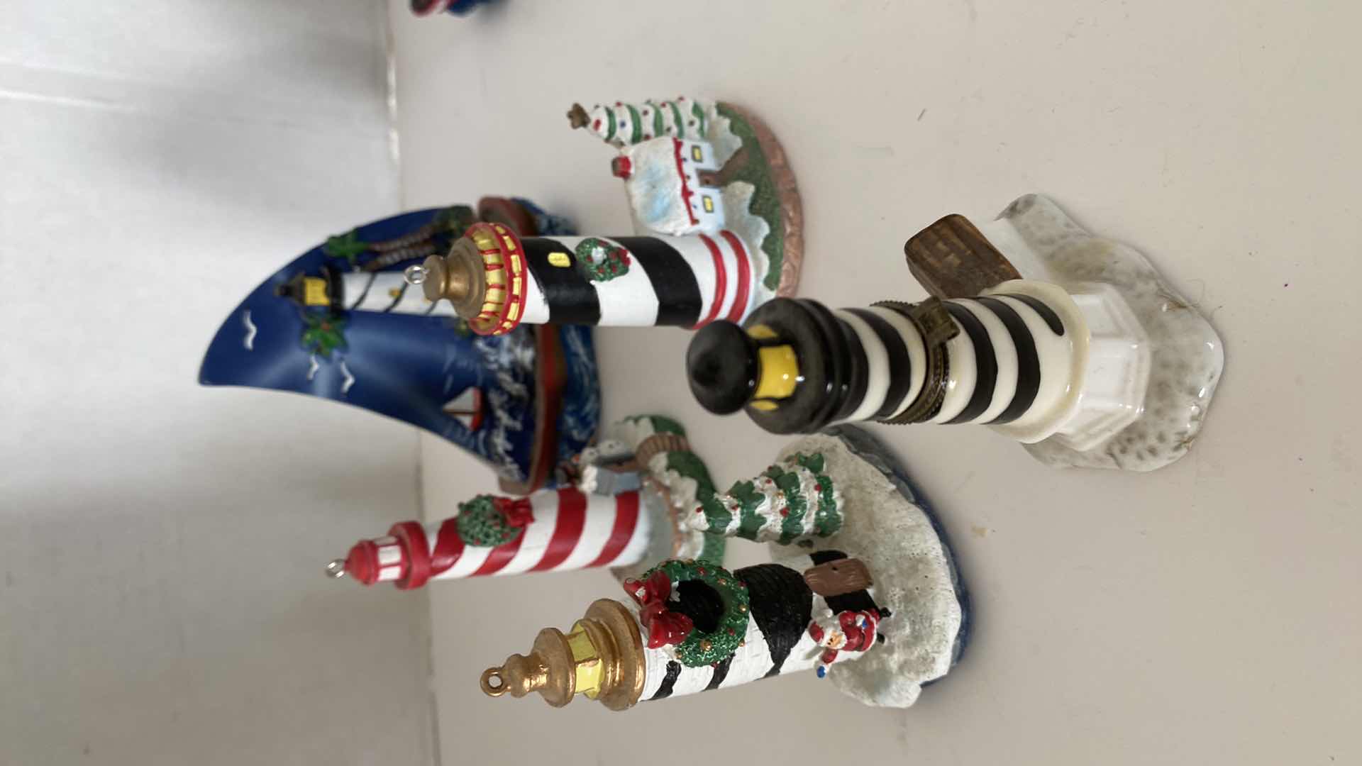 Photo 1 of CERAMICS AND WOOD LIGHT HOUSE ASSORTMENT TALLEST 4.5”