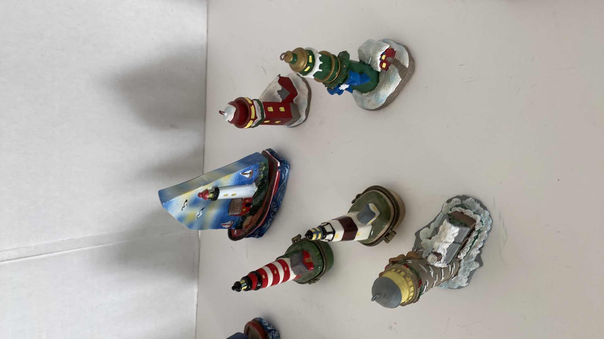 Photo 1 of CERAMICS AND WOOD LIGHT HOUSE ASSORTMENT TALLEST 4.5”