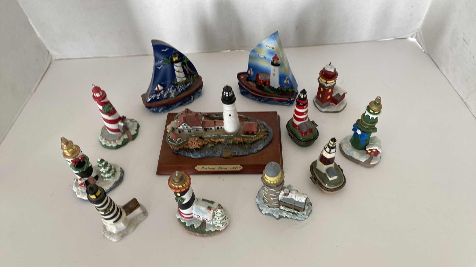 Photo 1 of CERAMICS AND WOOD LIGHT HOUSE ASSORTMENT TALLEST 4.5”