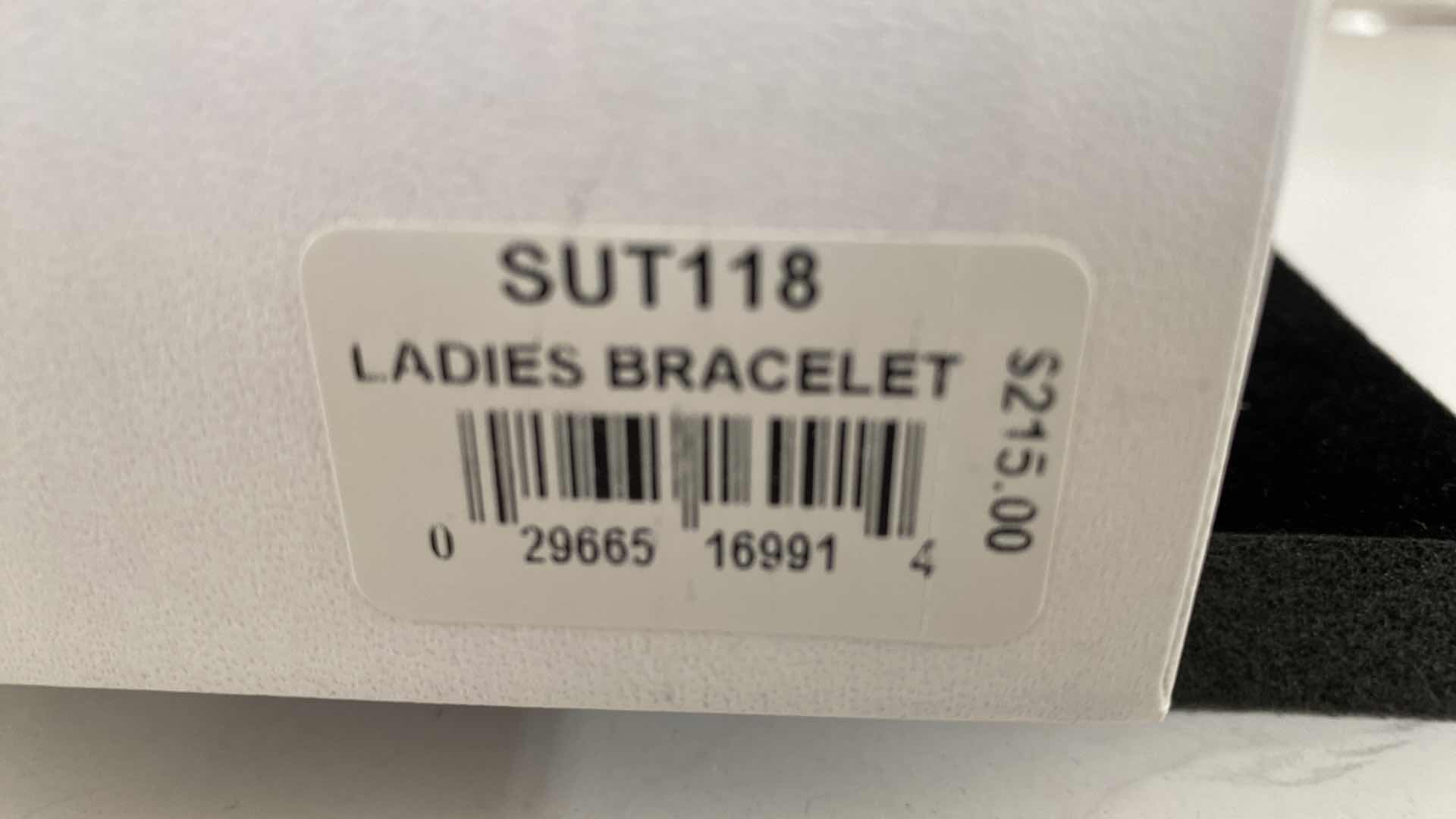 View 4 of WOMENS SEIKO GOLD TONE WATCH SUT118 IN BOX DAYS ARE RED WRITING