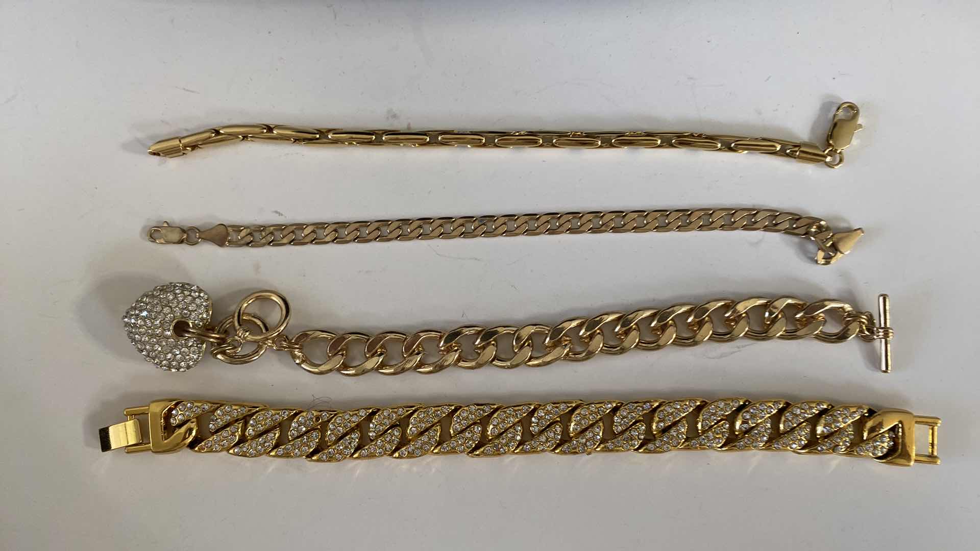 Photo 1 of WOMENS COSTUME JEWELRY 
GOLD PLATED CHAIN & COSTUME BRACELETS