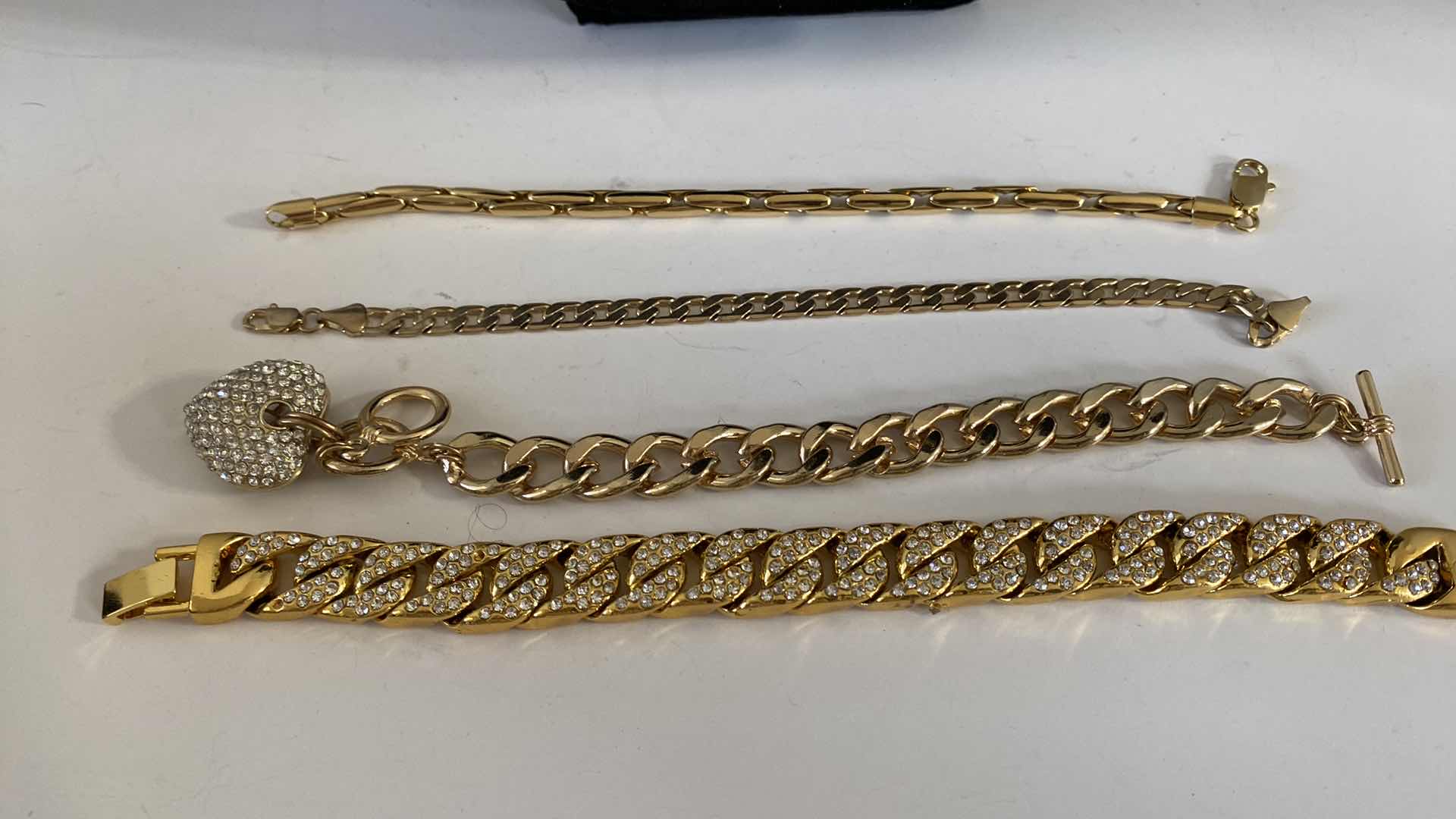 Photo 1 of WOMENS COSTUME JEWELRY 
GOLD PLATED CHAIN & COSTUME BRACELETS