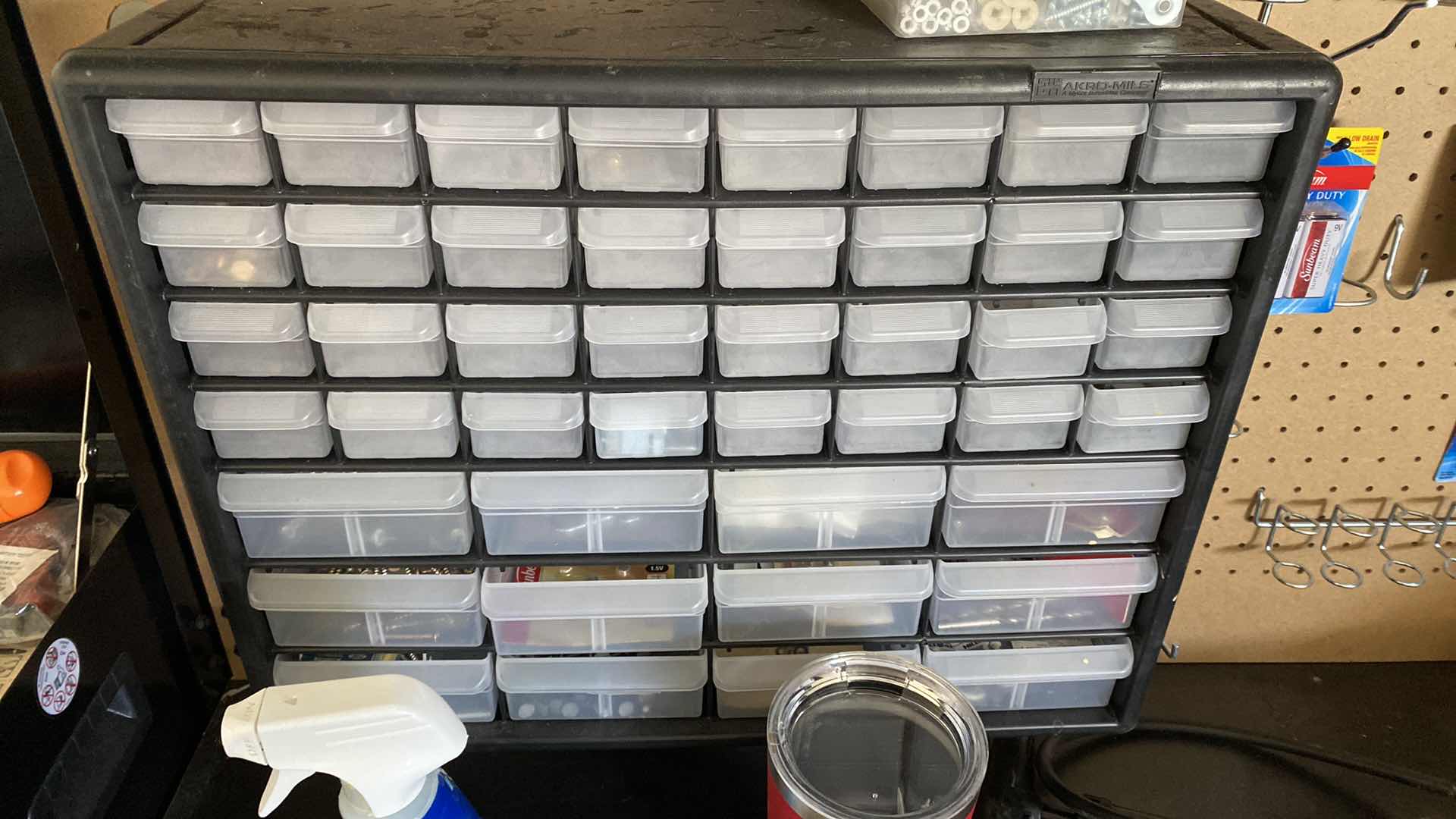 Photo 3 of WORK BENCH WITH ITEMS ON BENCH AND IN DRAWERS 48“ x 24“ H 64”