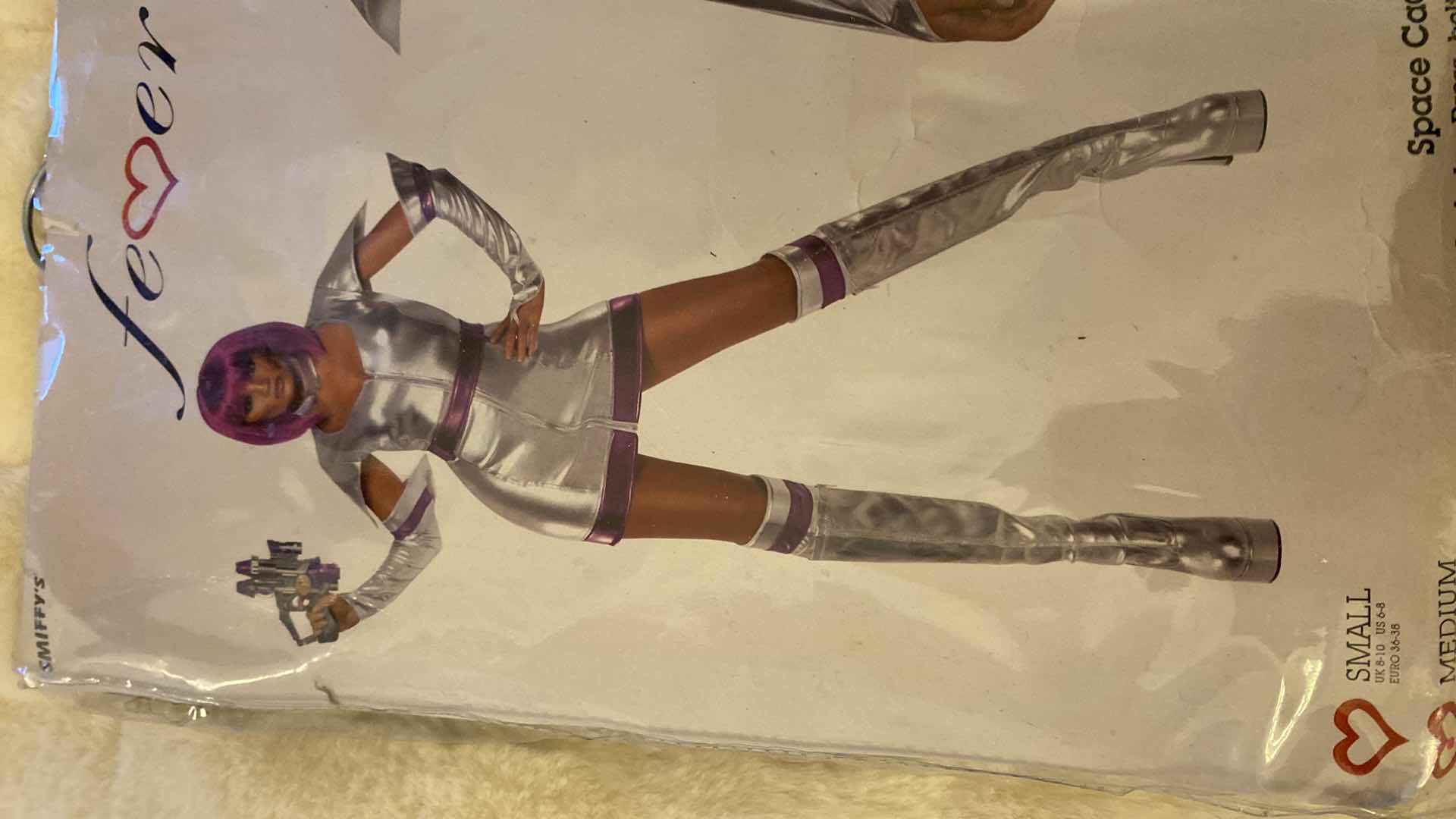 Photo 1 of  2 - WOMEN’S  SIZE MEDIUM COSTUMES