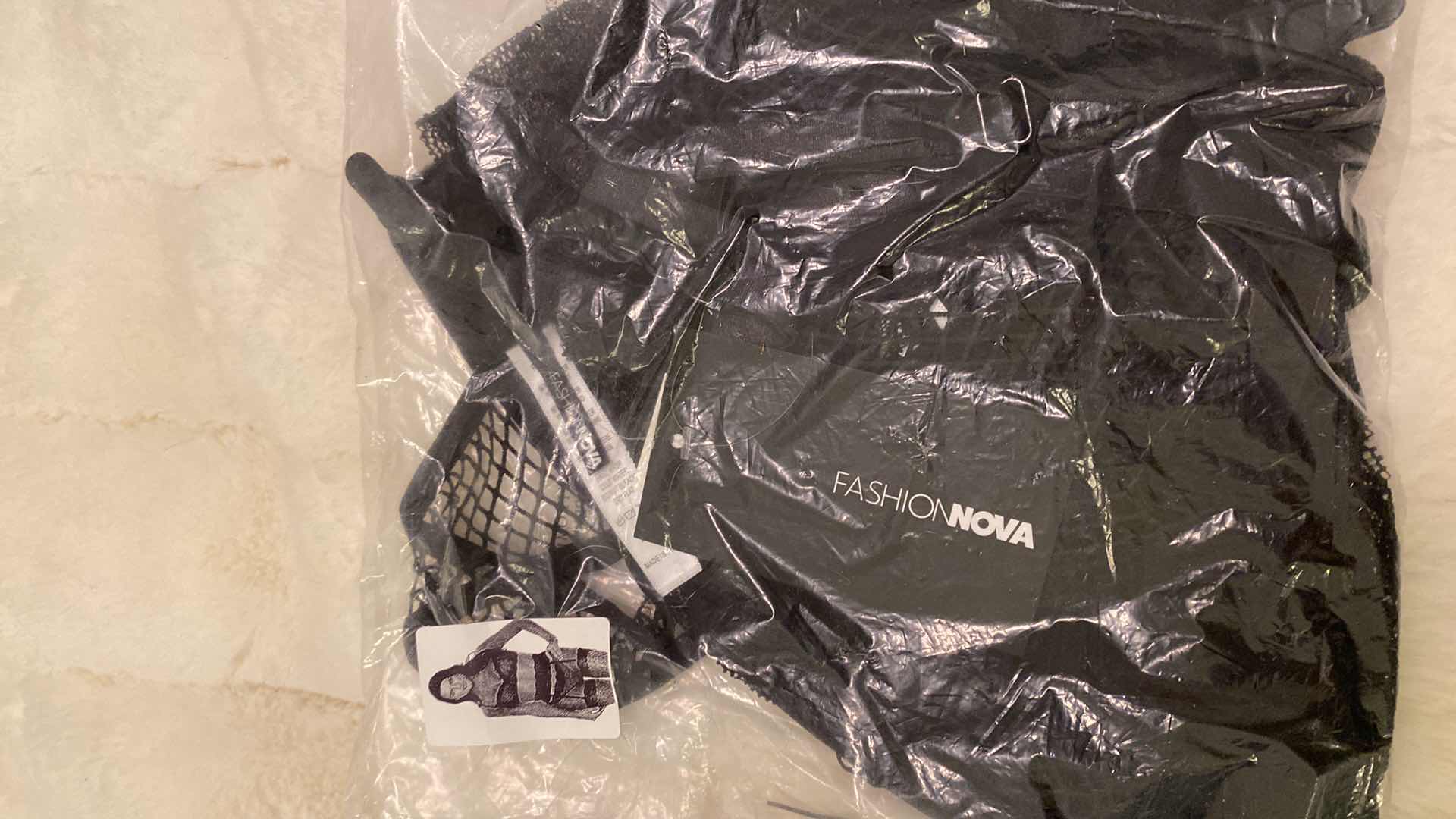 View 3 of 3 SETS OF WOMENS SIZE 2XL 3 PIECE SET BRA PANTY AND GARTER BELT MASTERPIECE FISHNET BY FASHION NOVA
