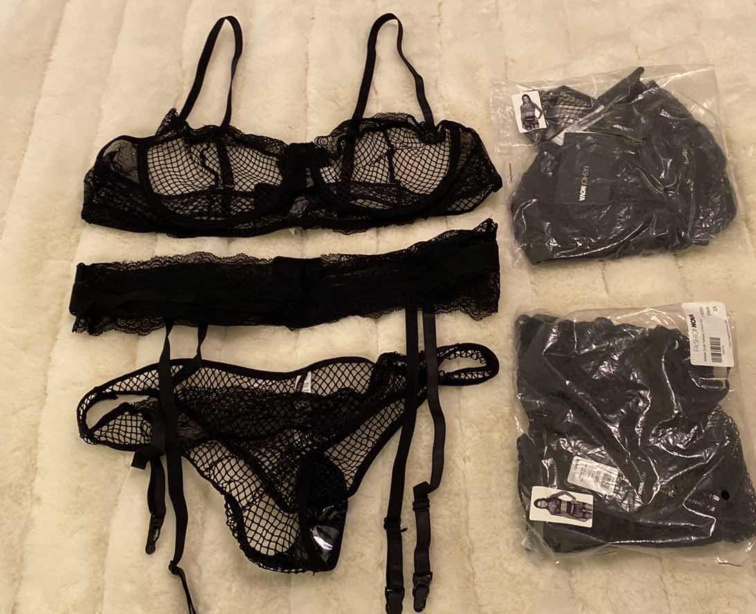 View 1 of 3 SETS OF WOMENS SIZE 2XL 3 PIECE SET BRA PANTY AND GARTER BELT MASTERPIECE FISHNET BY FASHION NOVA