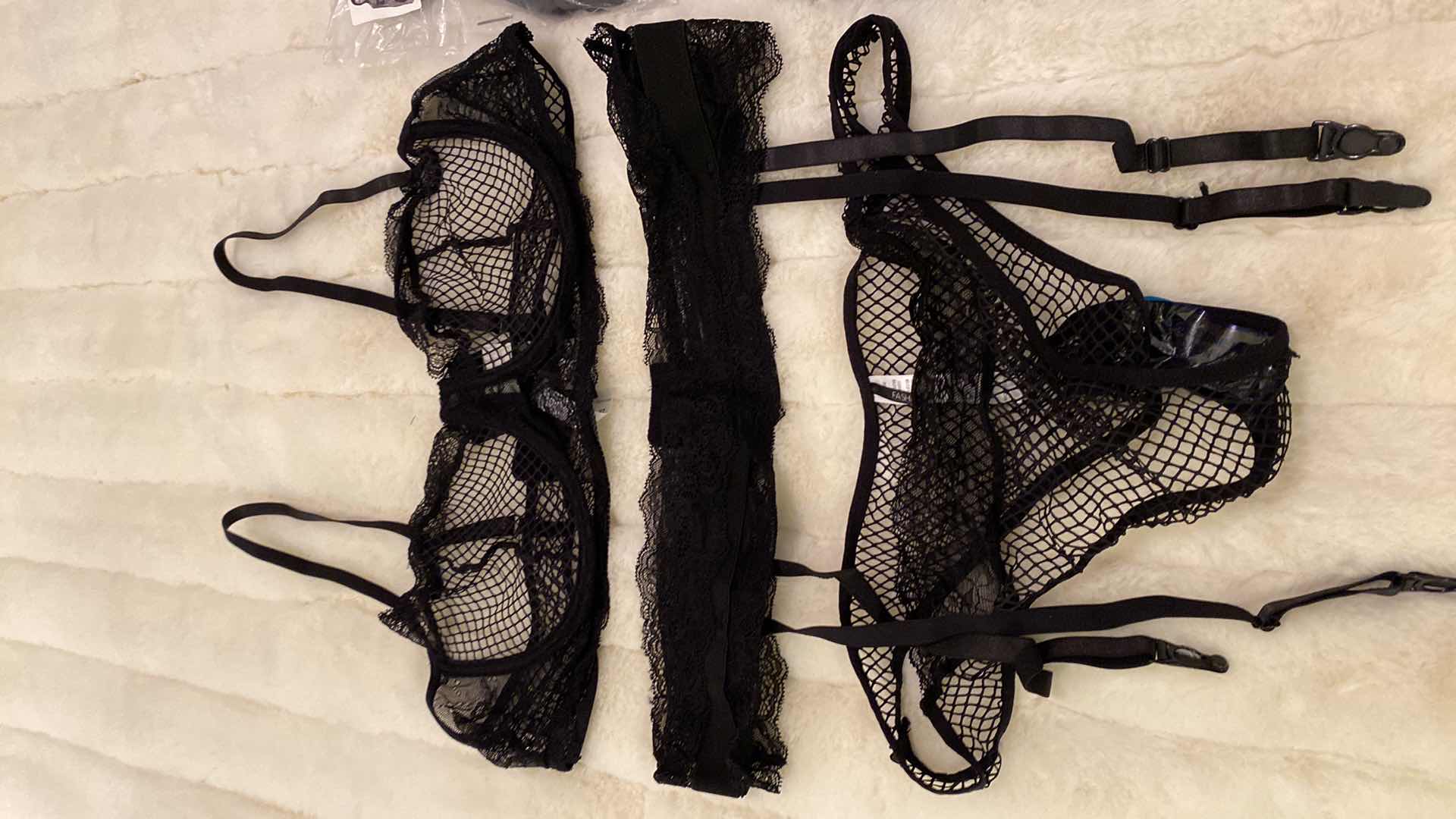 View 2 of 3 SETS OF WOMENS SIZE 2XL 3 PIECE SET BRA PANTY AND GARTER BELT MASTERPIECE FISHNET BY FASHION NOVA